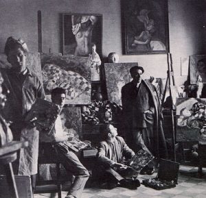 En el taller de Vazquez Díaz, con su maestro y varios discípulos